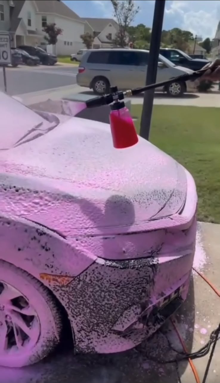 Car covered in wash foam
